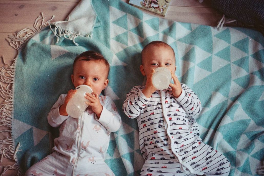 Baby with feeding bottles